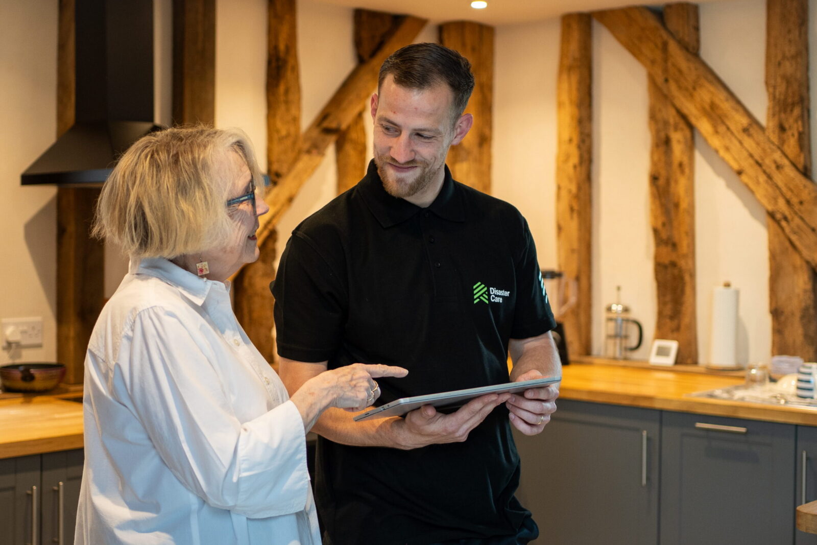 Disaster Care Specialist On Site With Policy Holder