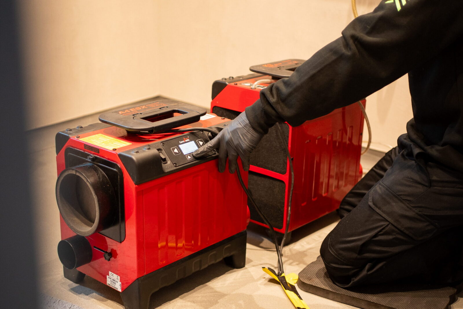 Disaster Care Installing Building Drying Equipment