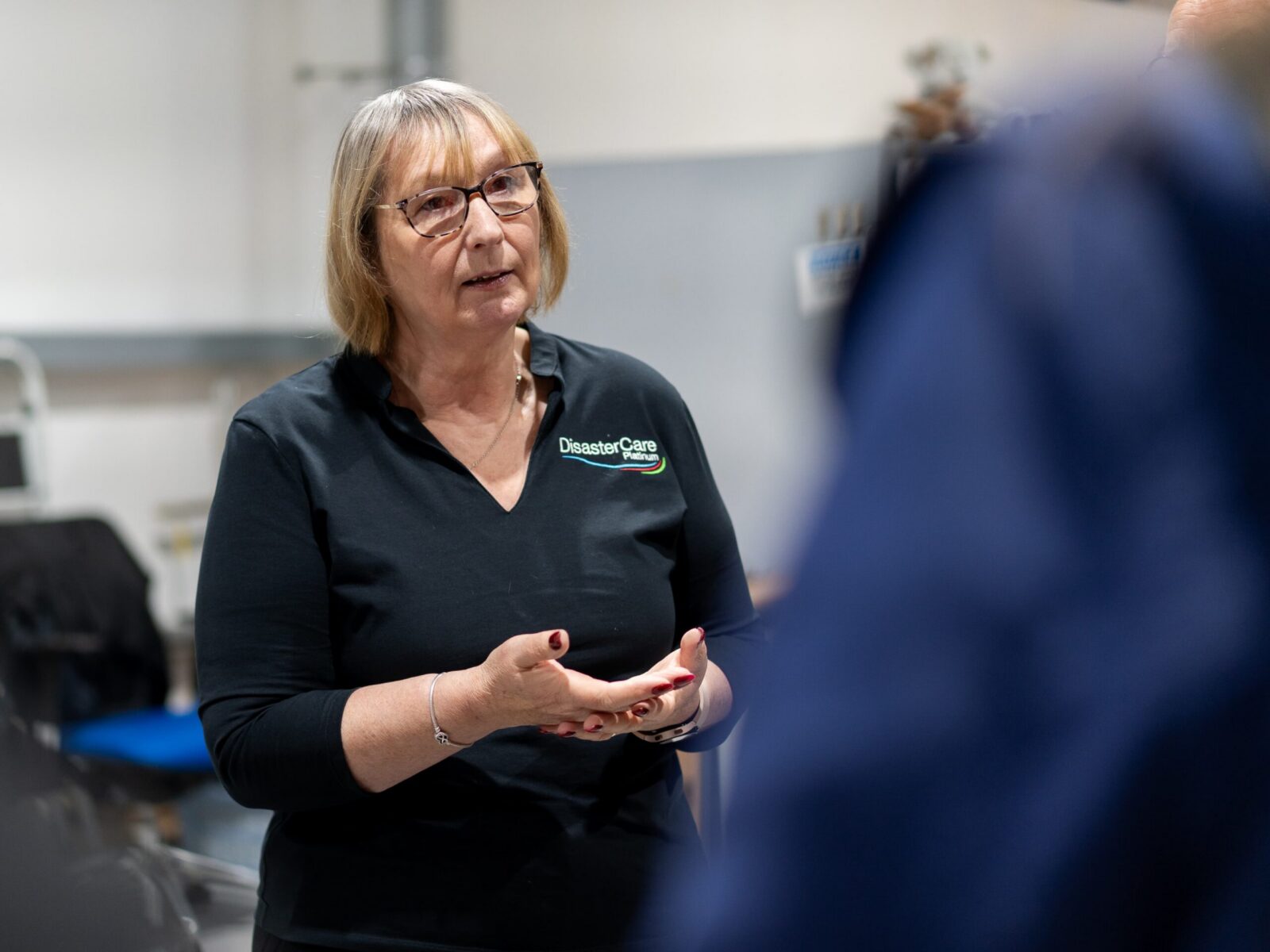 Disaster Care Team Member In Discussion