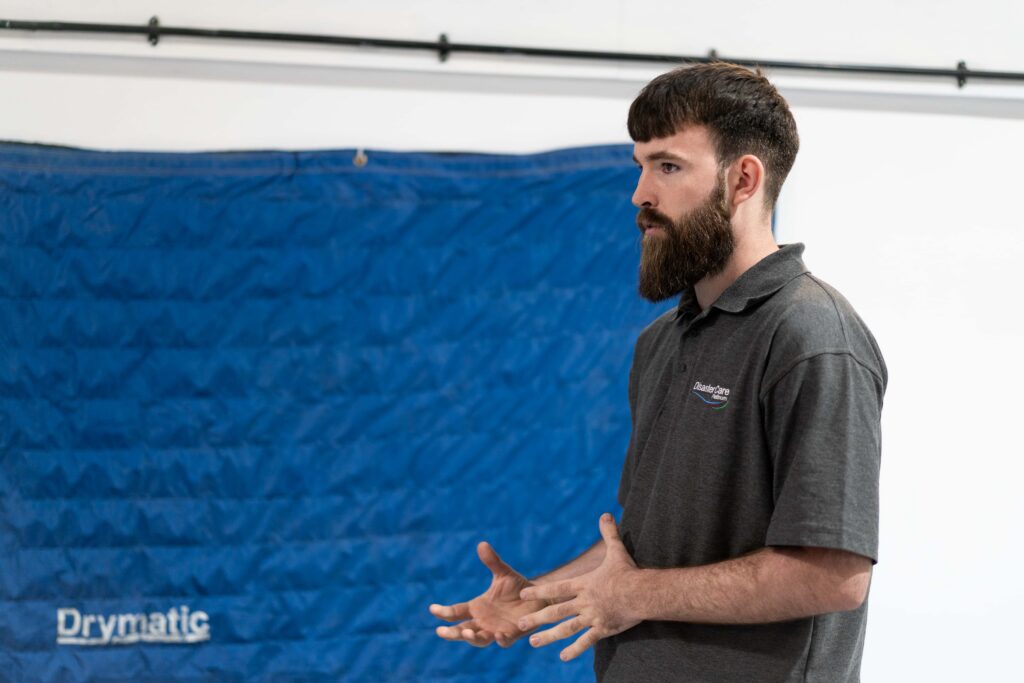 Disaster Care Drying Specialist In Discussion